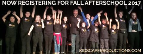 a group of people standing on top of a stage